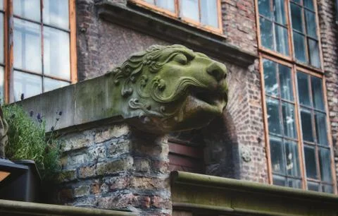 Water drain in the shape of a lion's head on Mariacka Street, Gdansk Stock Photos