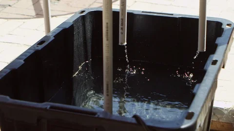 Water dripping into bucket Stock Footage 93524920