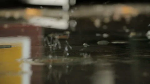 Water is dripping from ceiling to the floor in the warehouse Stock Footage 154770204
