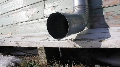Water dripping down when the snow melts in the early spring Stock Footage 108648861