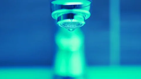 Water dripping from faucet. Sci-fi, slow motion cinemagraph Stock Footage 106437296
