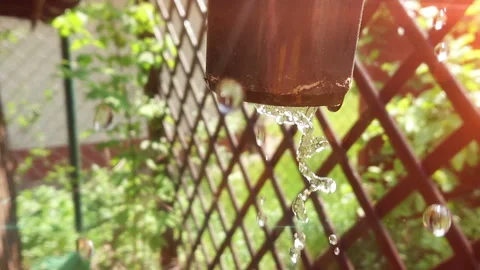 Water dripping from the gutter Stock Footage 108311053