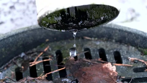 Water dripping from a gutter Stock Footage 302798163
