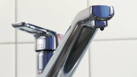Water is dripping from a kitchen tap Stock Footage 88390694