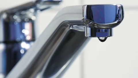 Water is dripping from a kitchen tap Stock Footage 88391158
