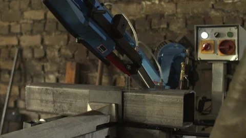Water dripping from machine on metal in workshop Stock Footage 152489148