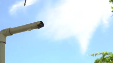 Water dripping from pipe during a drought Stock Footage 318011577