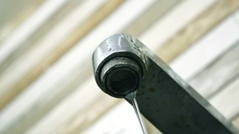 Water dripping from rustic tap Stock Footage 90811983