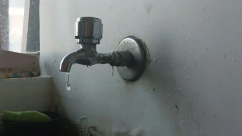 Water dripping from tap 1 Stock Footage 229249029