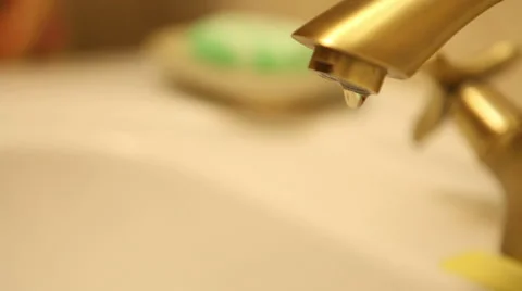 Water dripping from a tap close-up Stock Footage 60423110