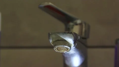 Water dripping from the tap close-up Stock-Footage 167584272