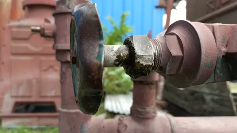 Water dripping from a Valve Stock Footage 140605948