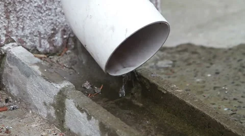 Water drips from the drain pipe Stock Footage 61436956