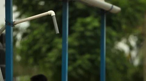 WATER DRIPS FROM PVC PIPE Stock Footage 59735413