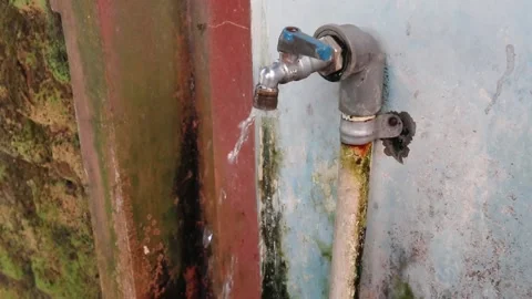 Water drips from rusty pipes. Stock Footage 174804887