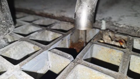 Water Drips Steadily From a Pipe Into a Tray With an Intriguing Display Stock Footage 345365200