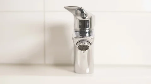 Water drips from the tap Stock Footage 124264436
