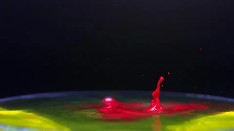Water drop and splash Stock Photos