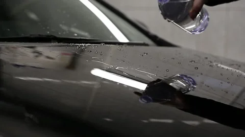 Water drop on car Stock Footage 68534991