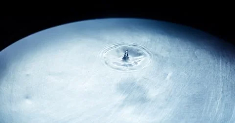 Water drop close up Stock Photos