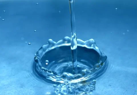Water drop close-up Stock Photos