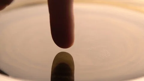 Water drop drips to liquid surface Full HD slow-motion video nature abstract Stock Footage 128746265