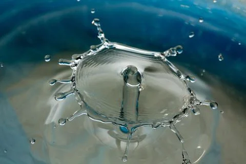 Water drop falling and colliding 写真素材