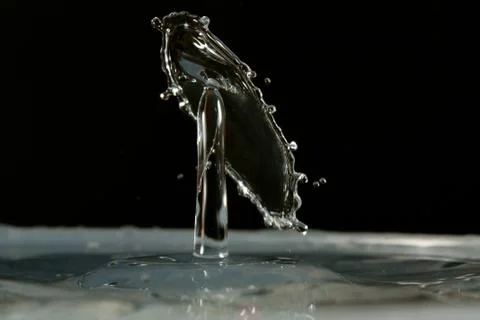 Water drop falling and colliding 스톡 사진