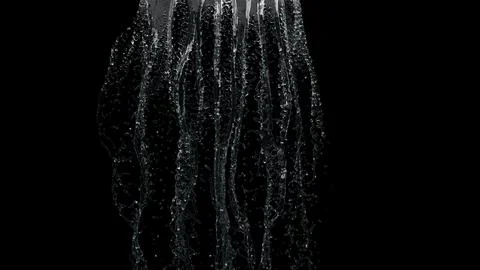Water drop falling on black background  Stock Photos