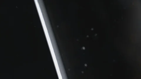 Water drop falling down to water surface Stock Footage 107948195