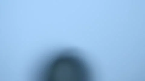 Water drop falling on a glass surface Stock-Footage 165457006