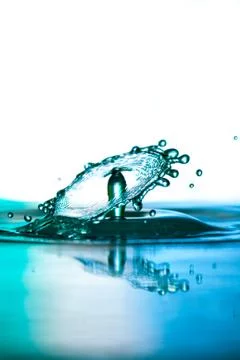 Water drop falling Stock Photos