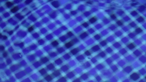 Water drop falling in a swimming pool Stock Footage 73232166