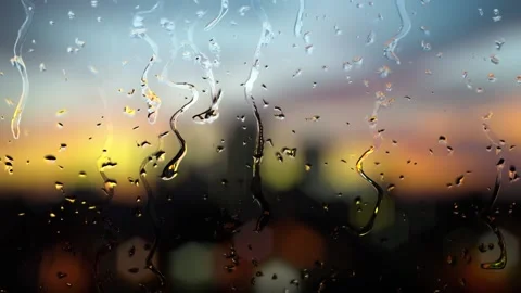 Water drop flow on a glass effect blur and bokeh glow of light background. Stock Footage 170642903