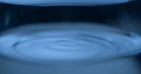Water drop in glass close up Stock Footage 93275114