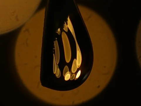 Water drop with light reflections Macro full hd Stock Photos