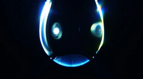 Water drop macro. The surface shimmers in different colors 스톡 동영상 45300052