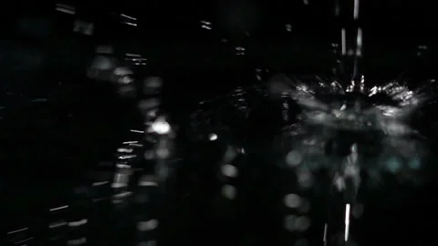 Water drop making splash Видео 86609877