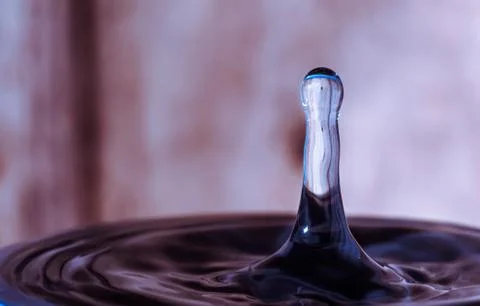 Water drop in the ocean - high temperature causes problems with water supply Stock Photos
