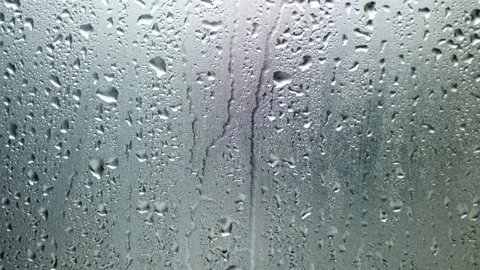 Water drop or Rain drop on glass, Water droplets on frosted glass walls or trans Stock Footage 176234967