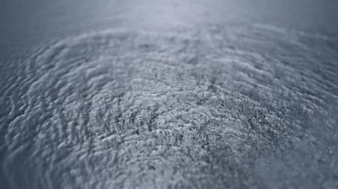 Water drop in puddle, Slow Motion Stock Footage 11840849