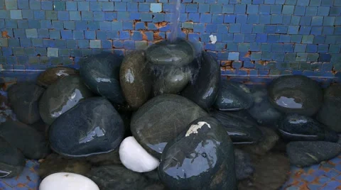 Water drop on rocks Stock Footage 47869584