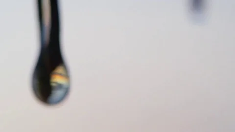 Water drop shows sunset Stock Footage 78999852