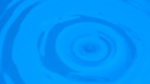 Water drop slow motion close up on deep blue background,liquid surface Stock Footage 136220740