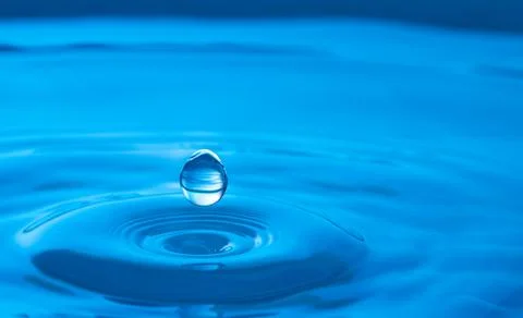 Water drop splash impact Stock Photos