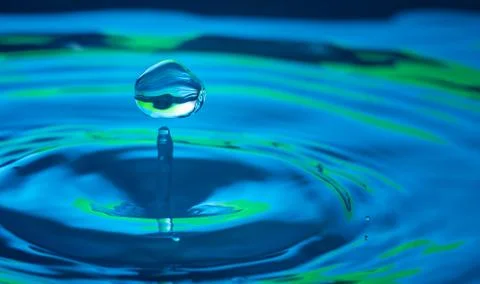 Water drop splash impact Stock Photos