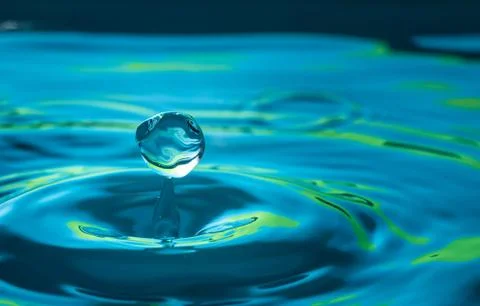 Water drop splash impact Stock Photos