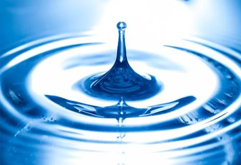 Water drop in sunlight Stock Photos