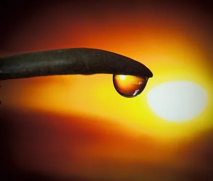 Water drop sunset Stock Photos
