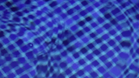 Water drop in a swimming pool Stock Footage 73227413